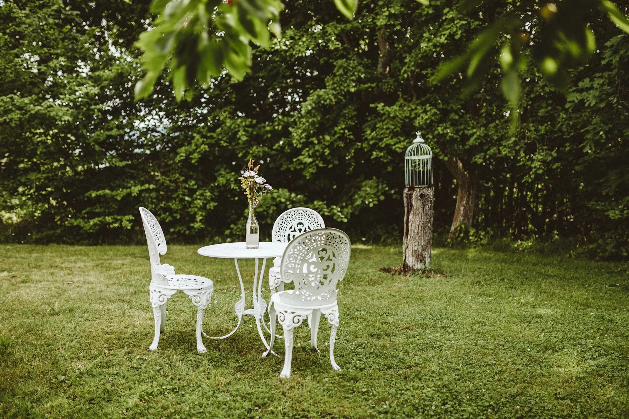 White garden furniture on the lawn
